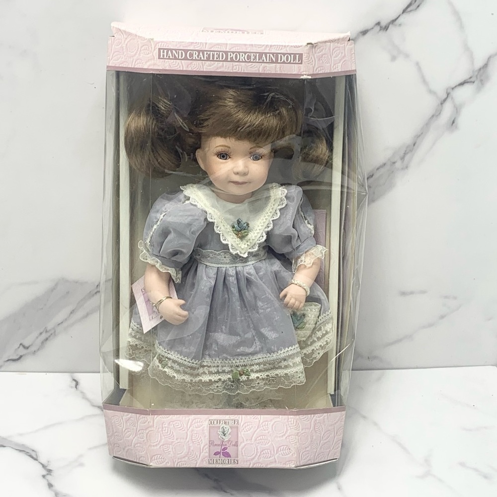 Collectible memories Porcelain doll.